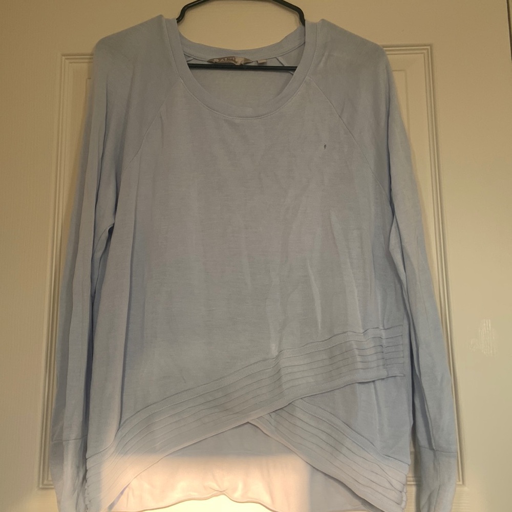light blue sweater